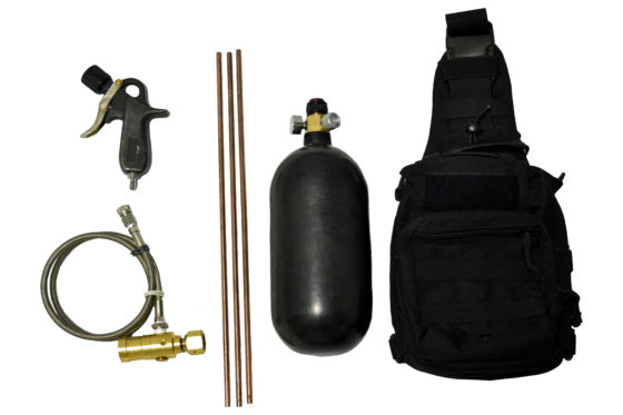 A black bottle, hose and other items are laid out.